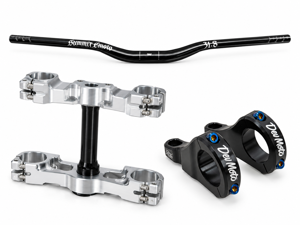 Handlebars, silver triple clamps and black direct mount on a white background